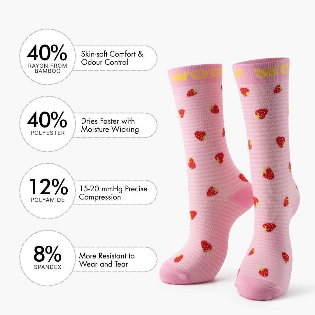 Strawberries Bamboo Crew Compression Socks accompanied by a material breakdown panel detailing the fabric mix: 40% bamboo viscose (breath comfort & odor control), 40% nylon (easy care & moisture wicking), 12% polyester (12-15mmHg precise compression), and 8% elastane (wear resistant to heel and toe).  