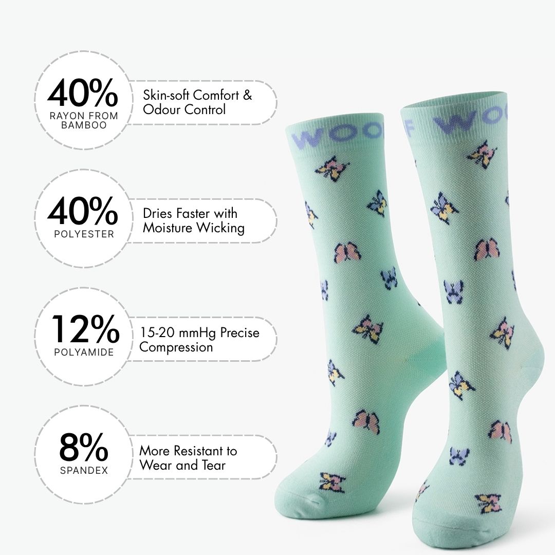A Butterfly Bamboo Crew Compression Socks accompanied by a material breakdown panel detailing the fabric mix: 40% bamboo viscose (breath comfort & odor control), 40% nylon (easy care & moisture wicking), 12% polyester (12-15mmHg precise compression), and 8% elastane (wear resistant to heel and toe).